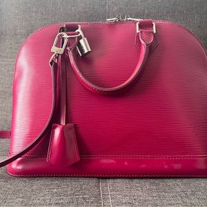 Louis Vuitton Alma Epi leather with strap.